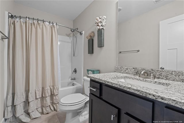 full bathroom featuring tile patterned flooring, vanity, toilet, and shower / bathtub combination with curtain