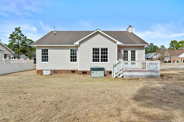 back of property featuring a shingled roof, crawl space, fence, a deck, and cooling unit