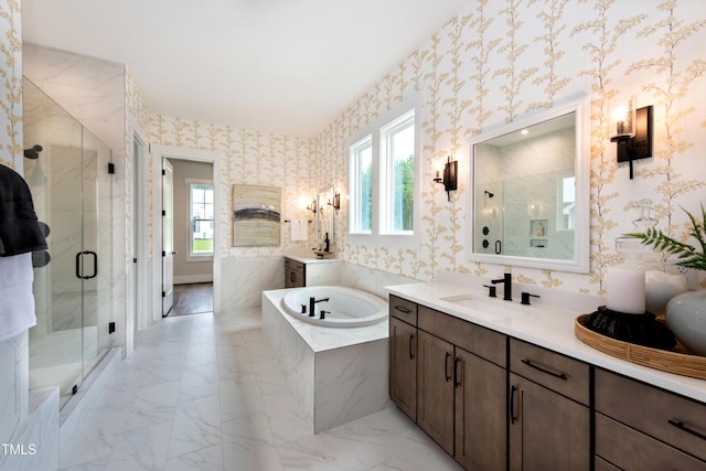 full bathroom with wallpapered walls, marble finish floor, vanity, a shower stall, and a bath