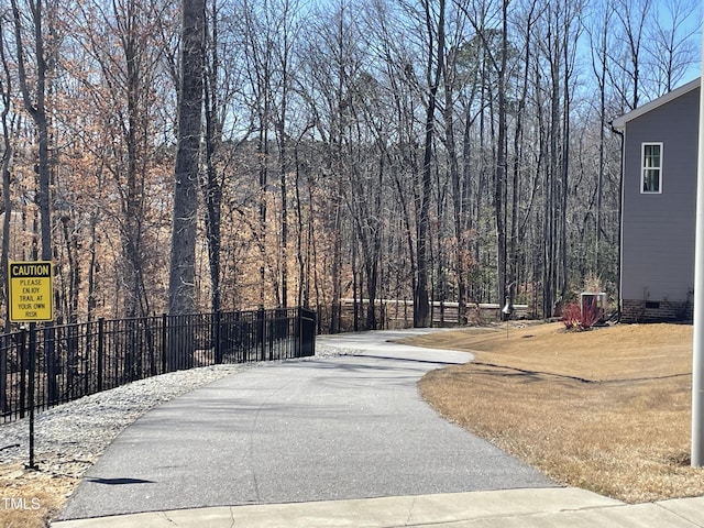 view of road with a view of trees