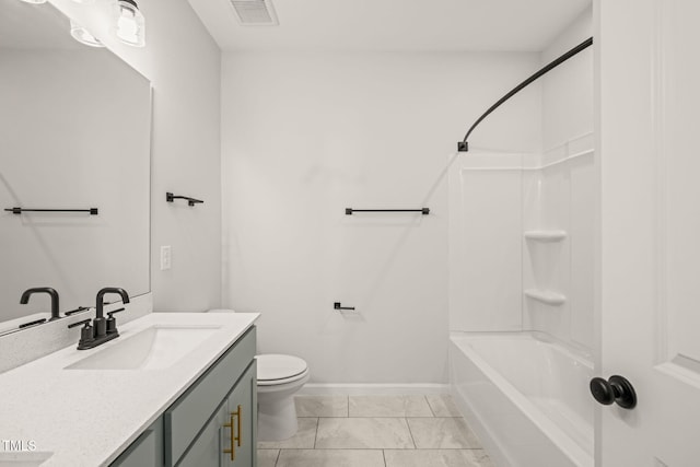 bathroom with toilet, vanity, visible vents, baseboards, and shower / washtub combination