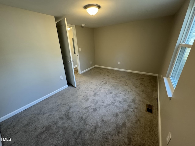 interior space featuring visible vents and baseboards