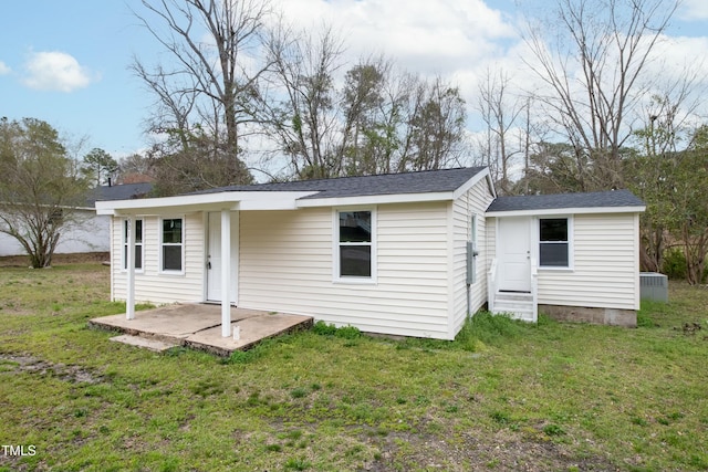 501 N 14th St, Erwin, NC 28339 - back of property featuring a lawn, entry steps, and a patio area
