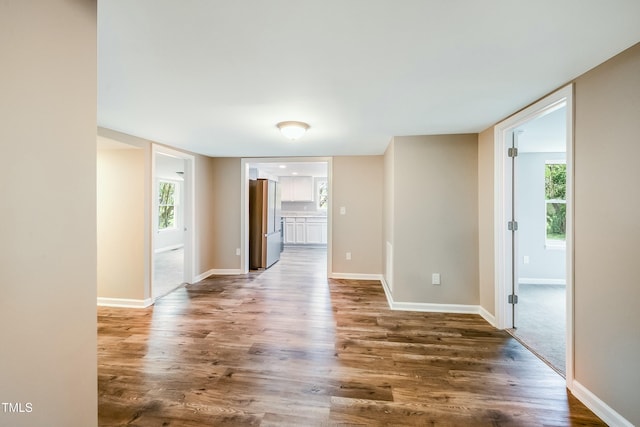 501 N 14th St, Erwin, NC 28339 - spare room with plenty of natural light, baseboards, and wood finished floors