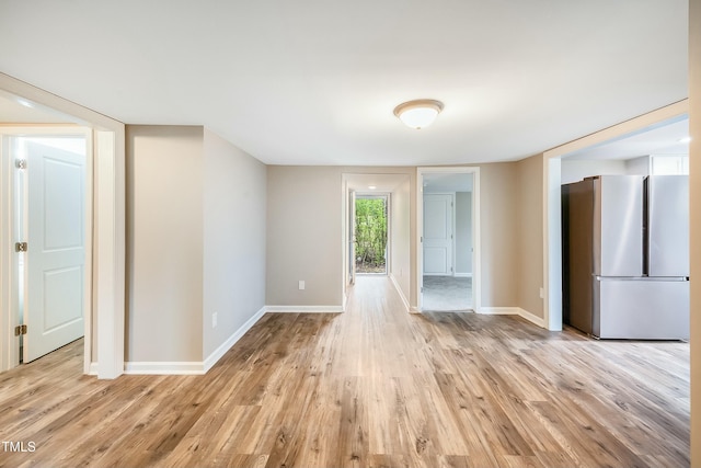 501 N 14th St, Erwin, NC 28339 - empty room featuring light wood-style floors and baseboards
