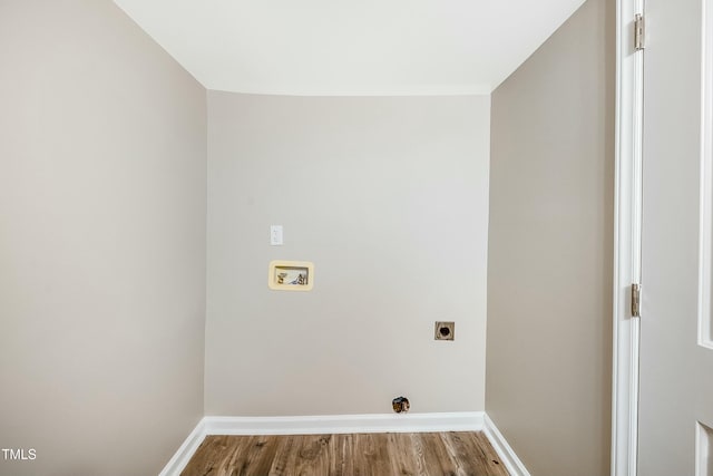 501 N 14th St, Erwin, NC 28339 - clothes washing area featuring hookup for a washing machine, electric dryer hookup, baseboards, and wood finished floors