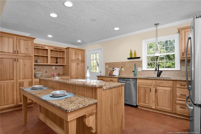 kitchen with a center island, open shelves, stainless steel appliances, a sink, and light stone countertops