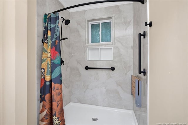 full bathroom with a shower stall