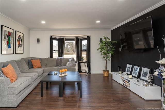 living room with baseboards, ornamental molding, wood finished floors, and recessed lighting