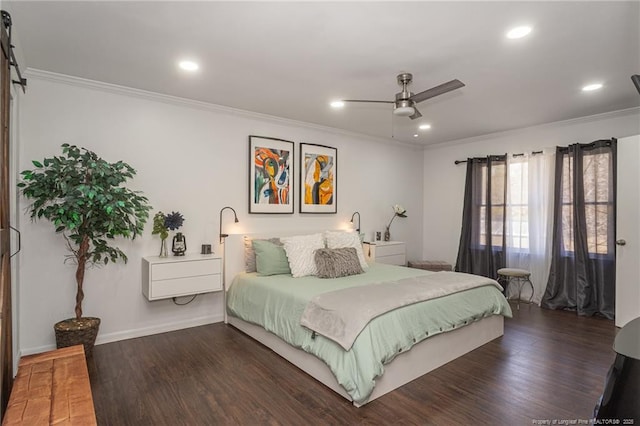 bedroom featuring ornamental molding and wood finished floors