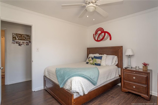 bedroom featuring baseboards, ornamental molding, ceiling fan, and dark wood-style flooring