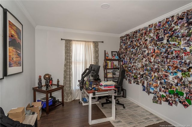 office space with ornamental molding, wood finished floors, and baseboards