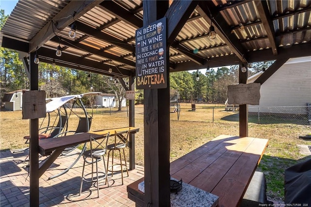 view of patio / terrace with fence