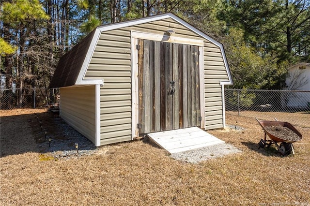 view of shed featuring a fenced backyard