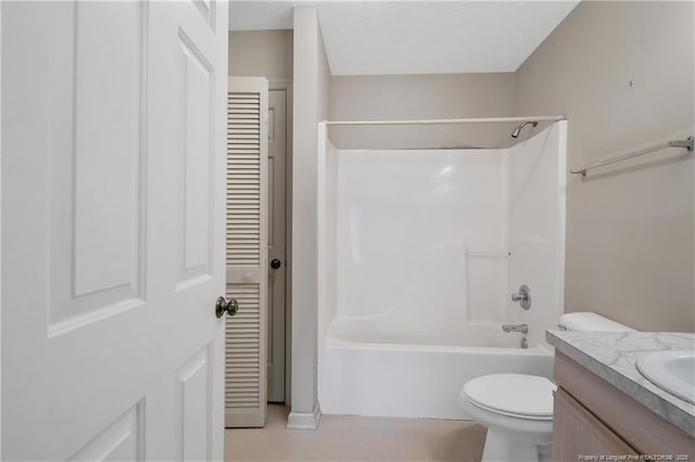 full bathroom with toilet, bathtub / shower combination, a textured ceiling, and vanity