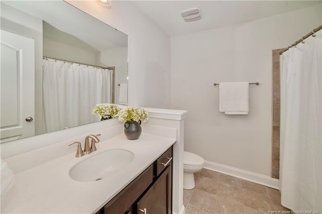 bathroom featuring baseboards, visible vents, toilet, curtained shower, and vanity