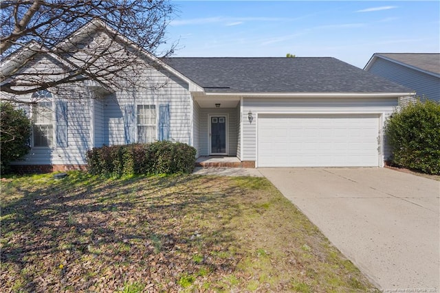 single story home featuring an attached garage, concrete driveway, and roof with shingles