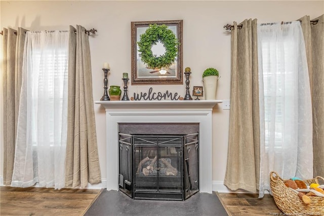 room details featuring a fireplace with flush hearth