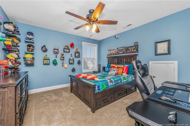 bedroom featuring a ceiling fan, light colored carpet, visible vents, and baseboards