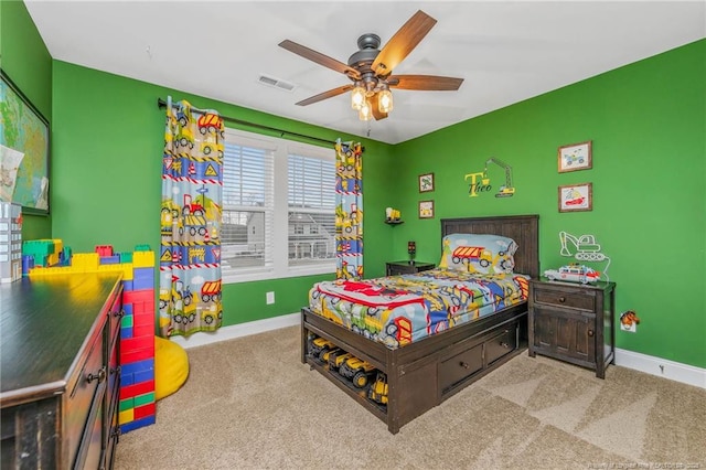 bedroom featuring carpet, visible vents, ceiling fan, and baseboards