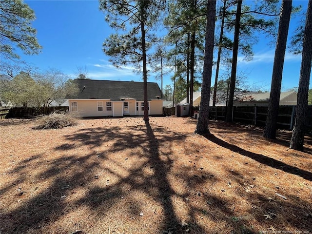 exterior space featuring a fenced backyard