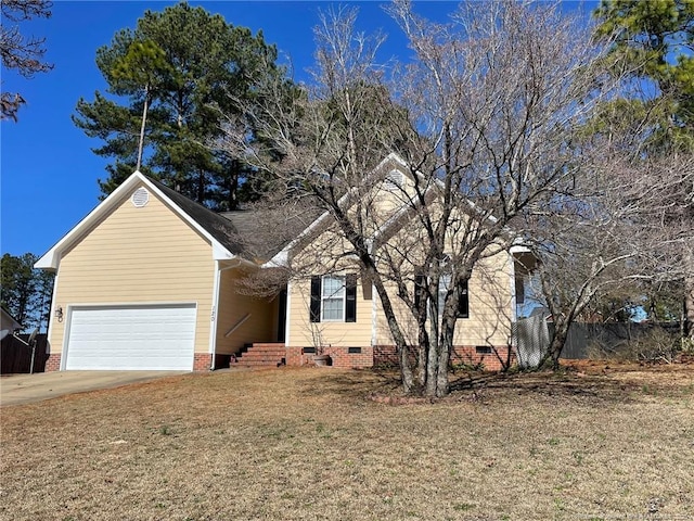 view of front of property with an attached garage, a front yard, crawl space, fence, and driveway