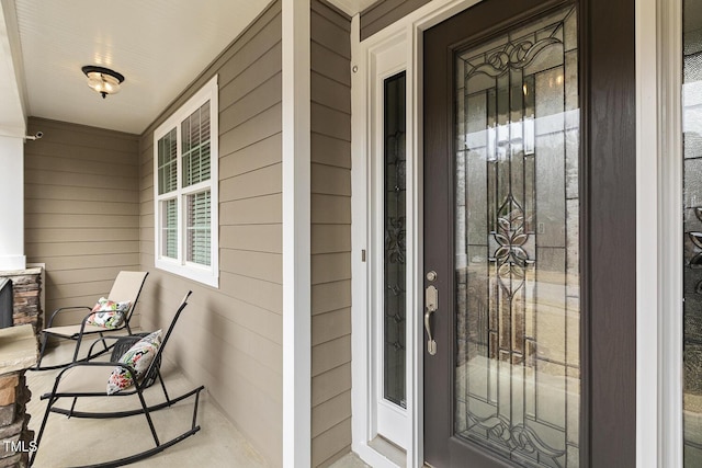 property entrance with a porch