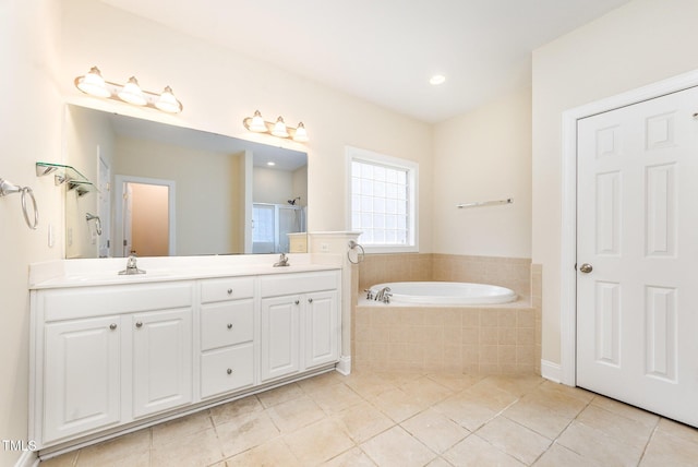209 Homegate Cir, Apex, NC 27502 - full bath with tile patterned floors, a bath, double vanity, and a stall shower