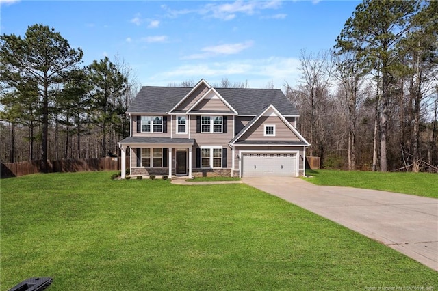 view of front of home featuring a front yard, fence, a garage, stone siding, and driveway