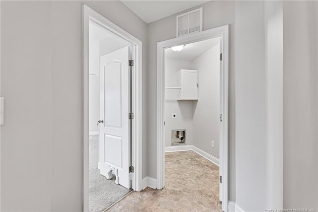 clothes washing area featuring baseboards, visible vents, and electric dryer hookup