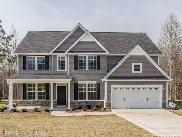 803 Equestrian Way, Raeford, NC 28376 - view of front of house featuring stone siding, concrete driveway, and a front yard