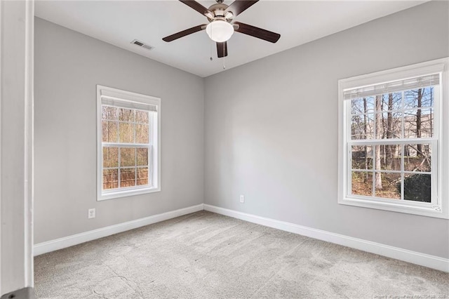 803 Equestrian Way, Raeford, NC 28376 - spare room featuring carpet floors, baseboards, ceiling fan, and plenty of natural light