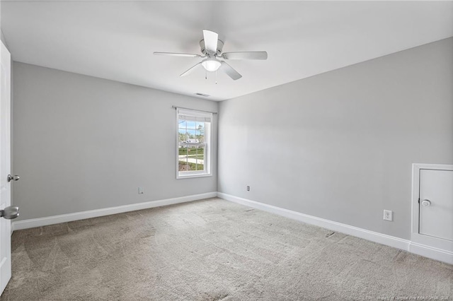 803 Equestrian Way, Raeford, NC 28376 - empty room featuring a ceiling fan, carpet floors, and baseboards