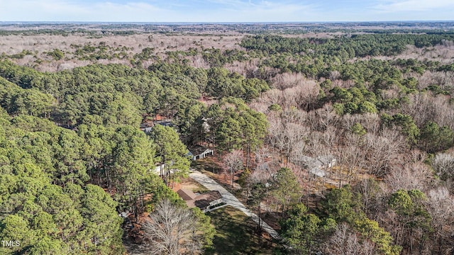 aerial view featuring a forest view