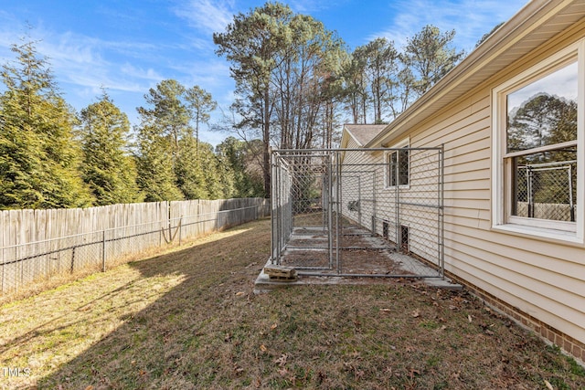 view of yard with a fenced backyard