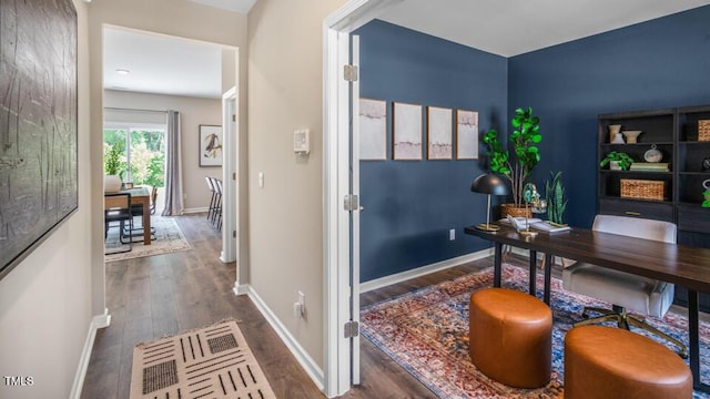 office with baseboards and wood finished floors