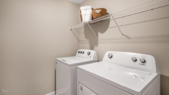 laundry area featuring laundry area and independent washer and dryer