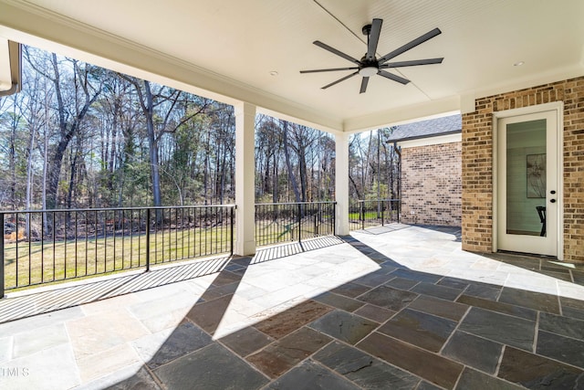 view of patio featuring ceiling fan