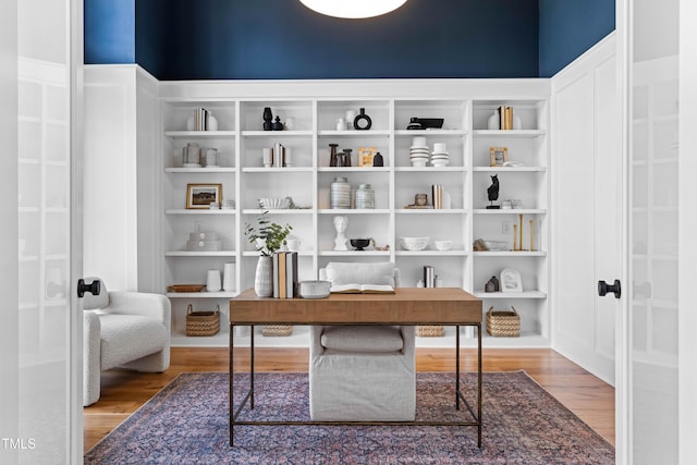 office area featuring wood finished floors and french doors