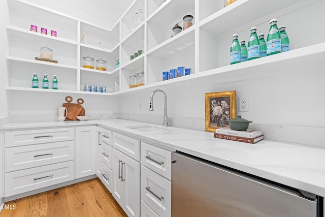 pantry with a sink