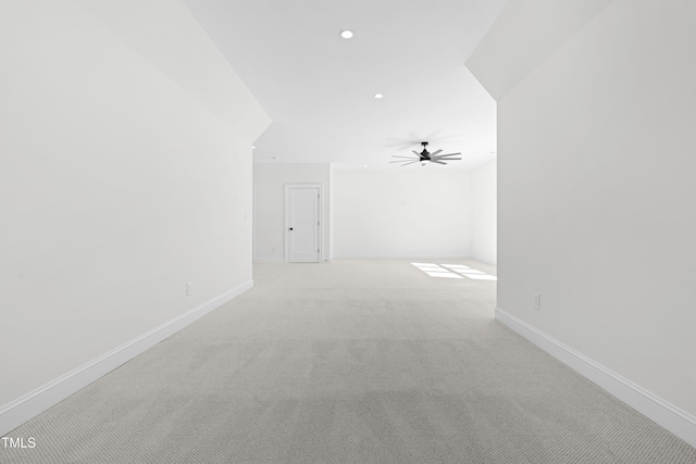 bonus room with ceiling fan, recessed lighting, light colored carpet, and baseboards