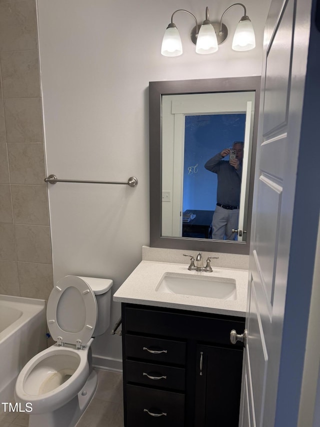 ensuite bathroom with ensuite bath, vanity, toilet, and tile patterned floors