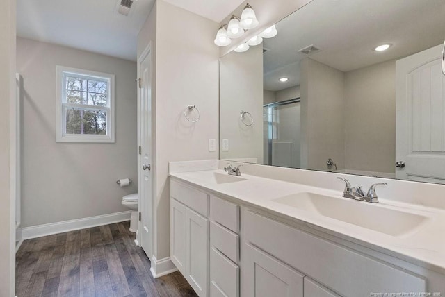 full bathroom featuring visible vents, a sink, and toilet