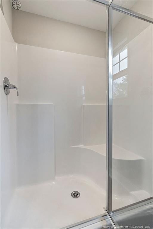 bathroom featuring a stall shower