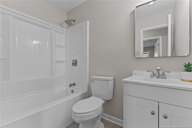 full bath with shower / tub combination, tile patterned flooring, toilet, vanity, and baseboards