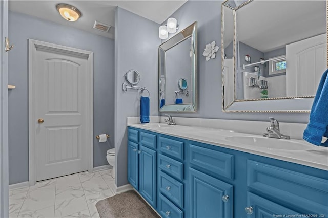 full bathroom with marble finish floor, double vanity, a sink, and visible vents