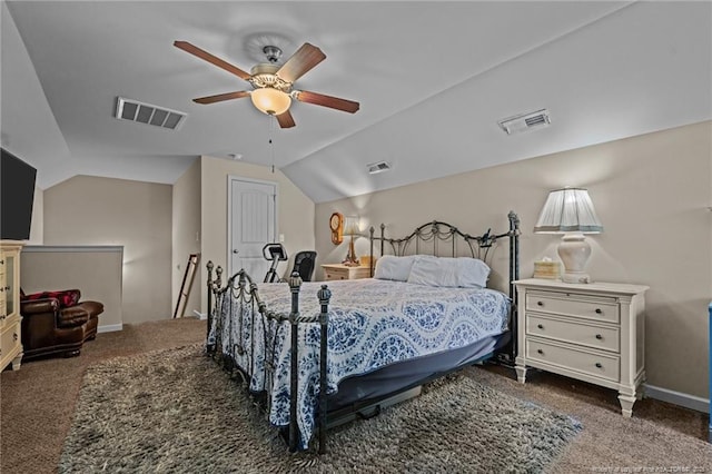 carpeted bedroom with vaulted ceiling, visible vents, and baseboards