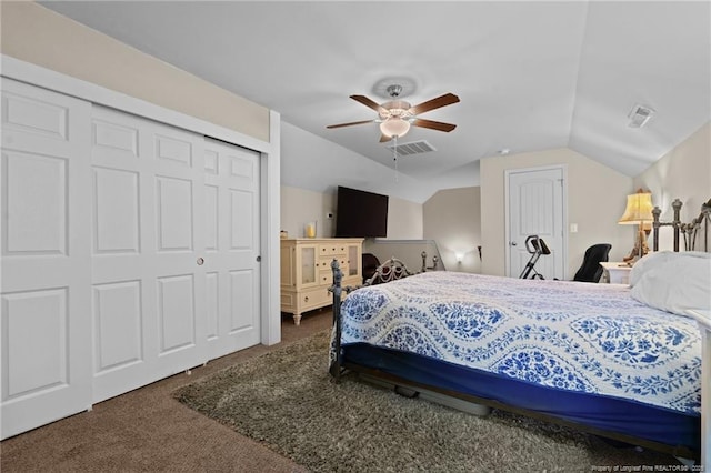 bedroom featuring lofted ceiling, carpet flooring, visible vents, and a ceiling fan