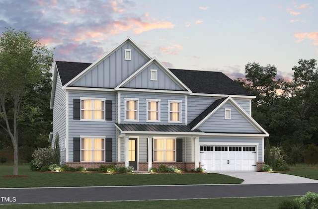 view of front of home with brick siding, a lawn, an attached garage, board and batten siding, and driveway