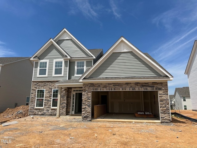 1016 Channel Drop Lp, Zebulon, NC 27597 - craftsman inspired home with stone siding and an attached garage